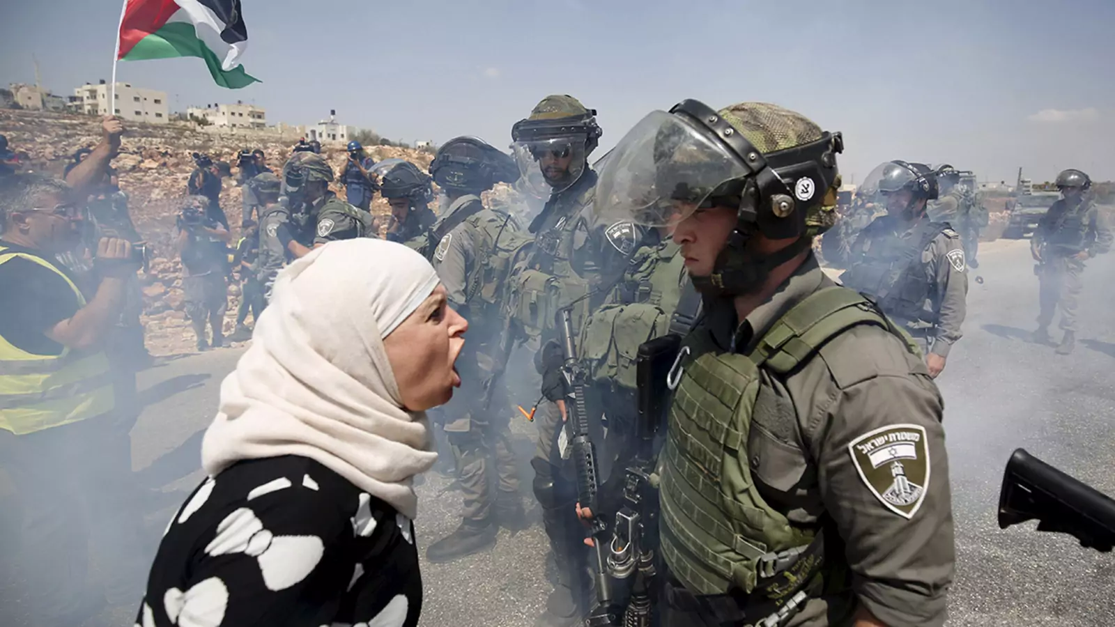 A Palestinian woman argues